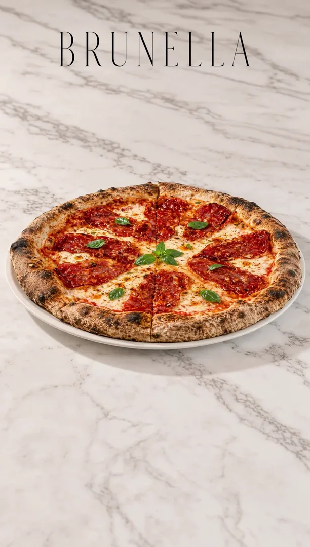 Brunella salami pizza — advertising orbit, E Leon Myers
